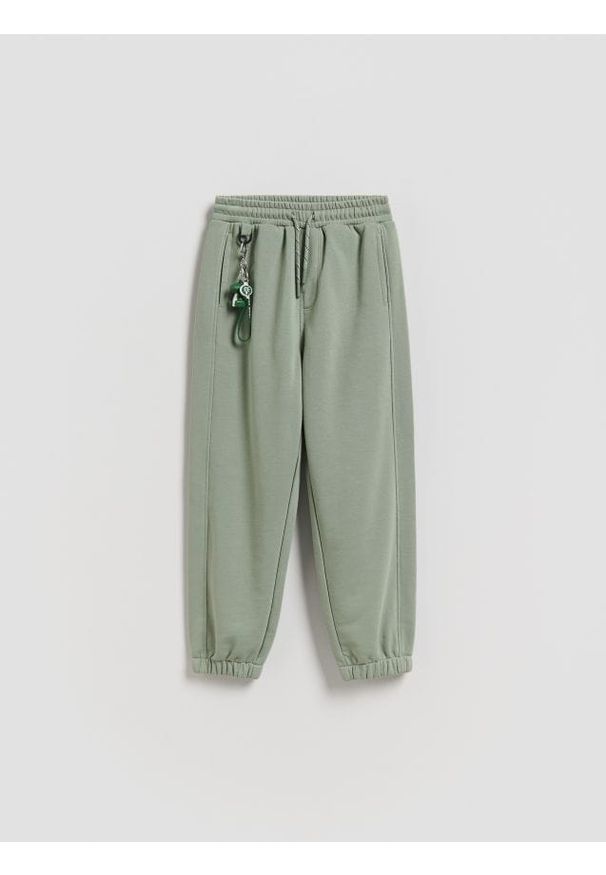 Reserved - Bawełniane spodnie jogger - jasnozielony. Kolor: zielony. Materiał: bawełna