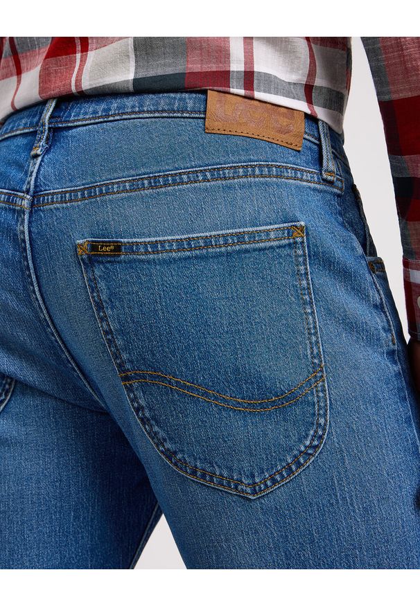 Lee - MESKIE SPODNIE LUKE INDIGO VINTAGE 112349321 L719015994. Okazja: na co dzień. Długość: długie. Styl: vintage