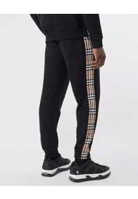 Burberry - BURBERRY - Czarne spodnie dresowe. Kolor: czarny. Materiał: dresówka. Wzór: nadruk #4