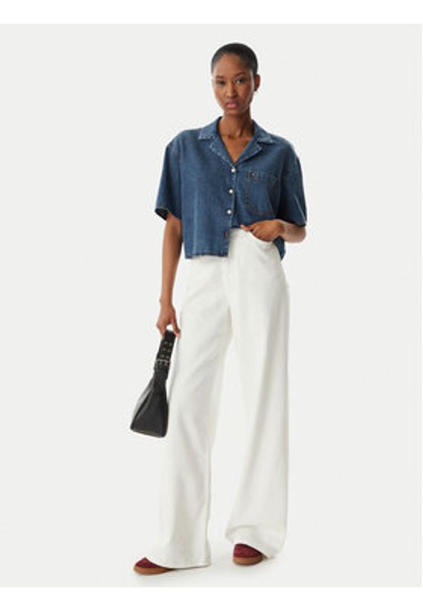 Tommy Jeans Koszula jeansowa DW0DW22216 Niebieski Relaxed Fit. Kolor: niebieski. Materiał: bawełna