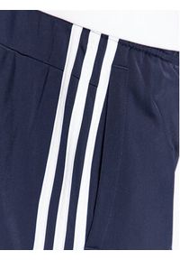 Adidas - adidas Spodnie dresowe Essentials Warm-Up 3-Stripes H46106 Granatowy Regular Fit. Kolor: niebieski. Materiał: syntetyk #6