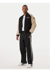Adidas - adidas Spodnie dresowe adicolor KE3501 Czarny Loose Fit. Kolor: czarny. Materiał: bawełna #5
