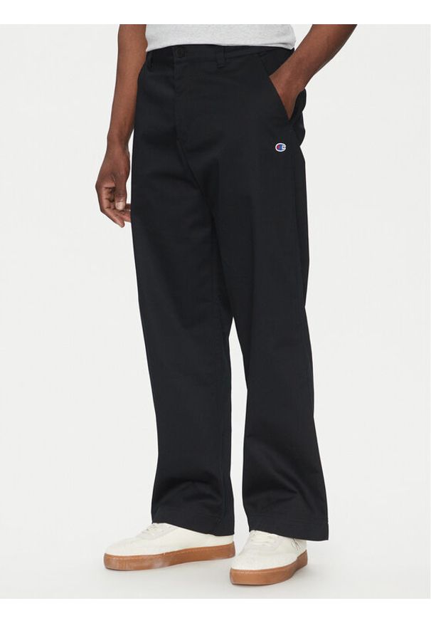 Champion Spodnie materiałowe 220715 Czarny Regular Fit. Kolor: czarny. Materiał: bawełna, syntetyk