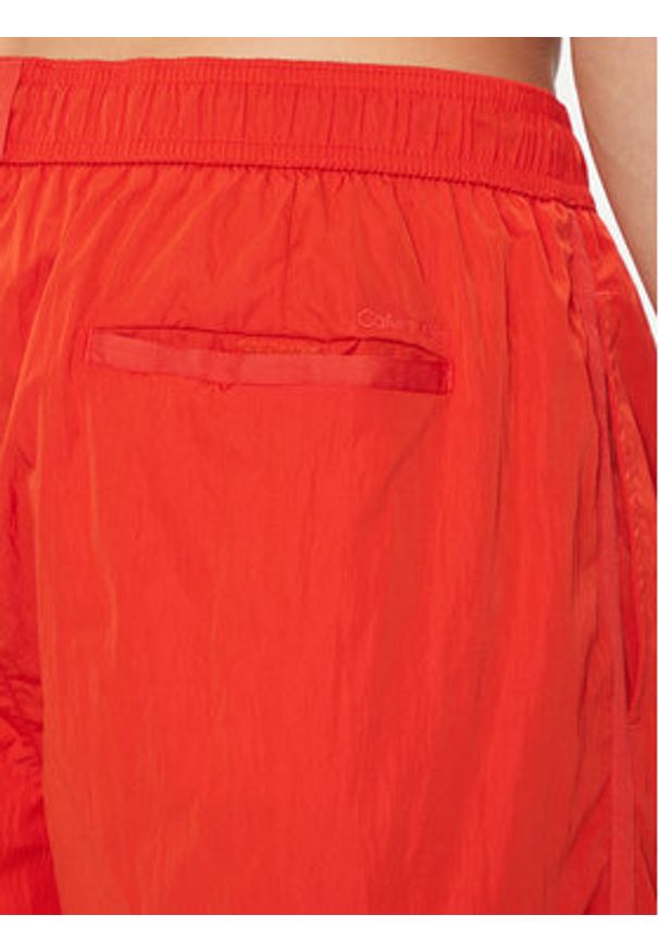 Calvin Klein Swimwear Szorty kąpielowe KM0KM01048 Czerwony Regular Fit. Kolor: czerwony. Materiał: syntetyk