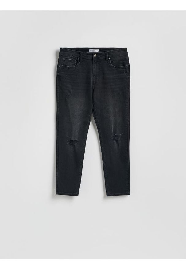 Reserved - Jeansy carrot slim z przetarciami - czarny. Kolor: czarny