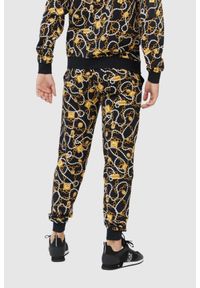 MOSCHINO Męskie spodnie dresowe w złote łańcuchy, Rozmiar L. Kolor: czarny. Materiał: dresówka