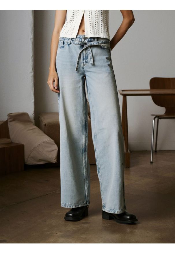 Sinsay - Jeansy wide leg - turkusowy. Kolor: turkusowy