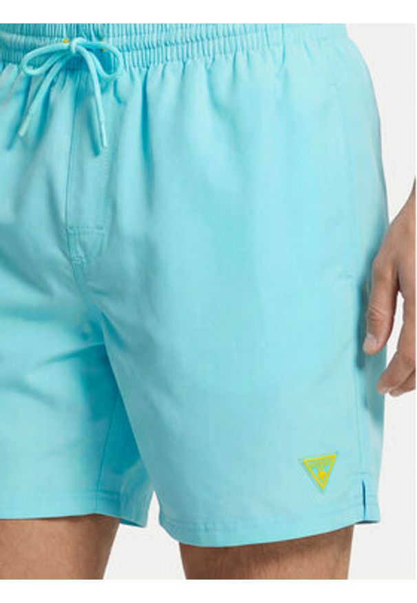 Guess Szorty kąpielowe F6GT24 WG282 MEDIUM Niebieski Regular Fit. Kolor: niebieski. Materiał: syntetyk