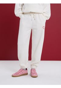 Sinsay - Polarowe spodnie jogger - kremowy. Kolor: kremowy. Materiał: polar #1