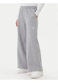 Adidas - adidas Spodnie dresowe ALL SZN Holiday Glitter Fleece JV5758 Szary Loose Fit. Kolor: szary. Materiał: bawełna #1