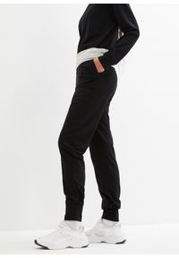 bonprix - Spodnie haremki z bawełny. Kolor: czarny. Materiał: bawełna. Styl: sportowy, elegancki