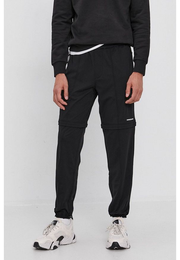 Calvin Klein Jeans Spodnie J30J318165.4890 męskie kolor czarny gładkie. Kolor: czarny. Materiał: dzianina. Wzór: gładki