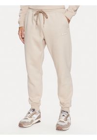 columbia - Columbia Spodnie dresowe Marble Canyon™ Heavyweight Fleece Pant Brązowy Regular Fit. Kolor: brązowy. Materiał: bawełna, syntetyk