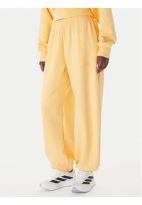 Adidas - adidas Spodnie dresowe Soft Lux KA7020 Pomarańczowy Loose Fit. Kolor: pomarańczowy. Materiał: syntetyk #1