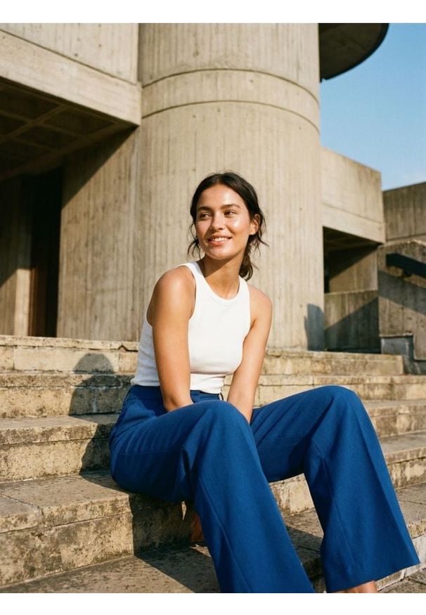 Sinsay - Spodnie wide leg z domieszką wiskozy - niebieski. Kolor: niebieski. Materiał: wiskoza