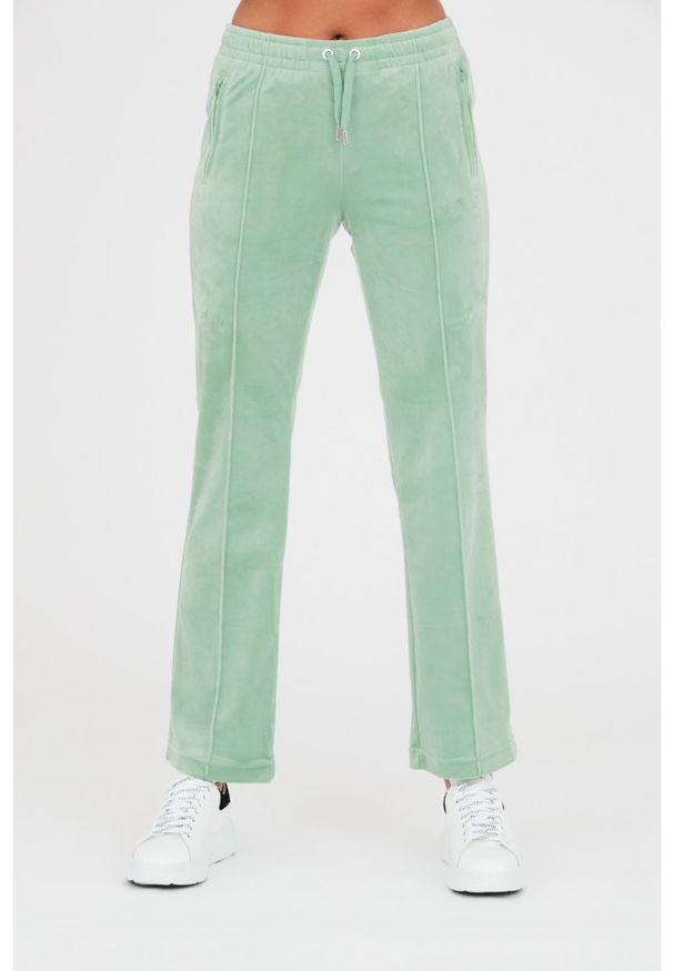 Juicy Couture - JUICY COUTURE Seledynowe spodnie dresowe Tina. Kolor: niebieski. Materiał: dresówka
