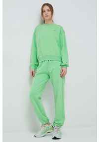 Champion spodnie dresowe kolor zielony gładkie. Kolor: zielony. Materiał: dresówka. Wzór: gładki #3