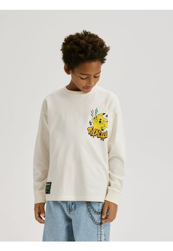 Reserved - Longsleeve Pokémon - złamana biel. Materiał: dzianina, bawełna. Długość rękawa: długi rękaw