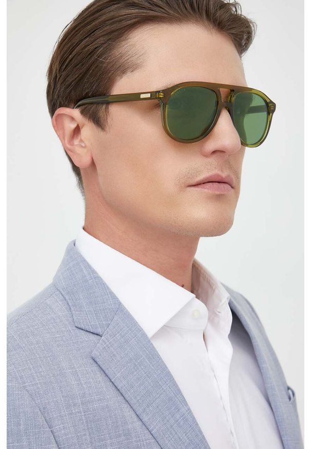 Gucci okulary przeciwsłoneczne GG1320S męskie kolor zielony. Kolor: zielony