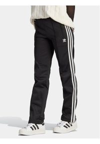 Adidas - adidas Spodnie dresowe adicolor Classics Firebird IL8763 Czarny Regular Fit. Kolor: czarny. Materiał: syntetyk #1