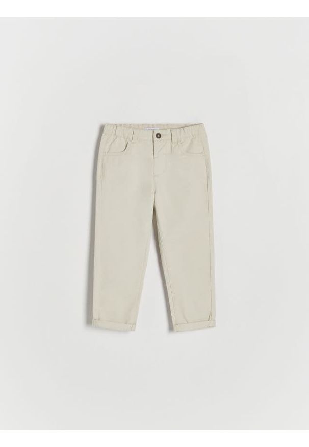 Reserved - Tkaninowe spodnie chino - beżowy. Kolor: beżowy. Materiał: tkanina