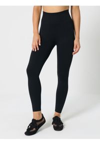 Sinsay - Legginsy sportowe - czarny. Kolor: czarny. Styl: sportowy