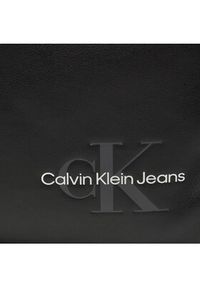 Calvin Klein Jeans Saszetka Monogram Soft K50K512032 Czarny. Kolor: czarny. Materiał: skóra