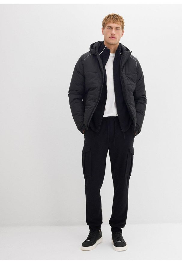 bonprix - Ciepłe spodnie cargo z polarowego materiału, regular fit. Kolor: czarny. Materiał: polar, materiał