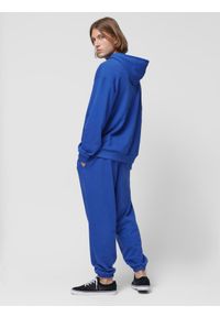 outhorn - Spodnie dresowe joggery męskie Outhorn - kobaltowe. Kolor: niebieski. Materiał: dresówka. Wzór: ze splotem, gładki