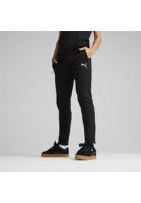 Puma - Męskie spodnie EVOSTRIPE PUMA Black. Kolor: czarny