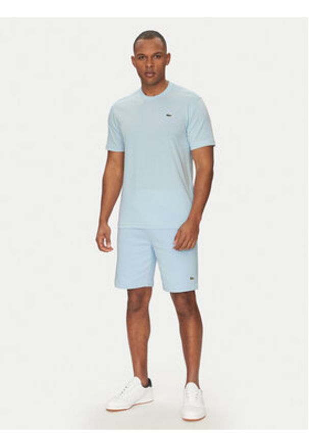 Lacoste T-Shirt TH7618 Błękitny Regular Fit. Kolor: niebieski. Materiał: syntetyk, bawełna