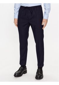 Calvin Klein Spodnie materiałowe K10K109956 Granatowy Regular Fit. Kolor: niebieski. Materiał: wełna #1