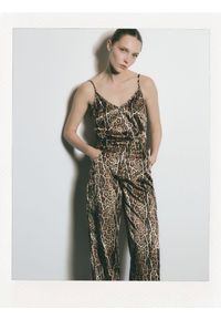 Reserved - Spodnie ze zwierzęcym wzorem - wielobarwny. Materiał: tkanina. Wzór: motyw zwierzęcy #1