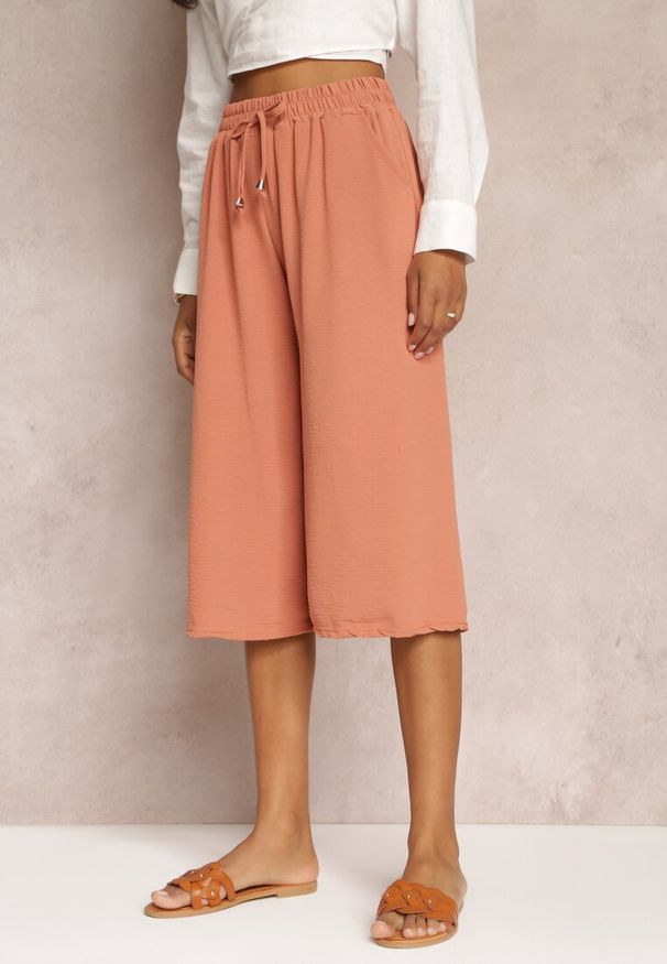 Renee - Pomarańczowe Szerokie Spodnie Bailesa. Kolor: pomarańczowy. Materiał: tkanina. Wzór: gładki