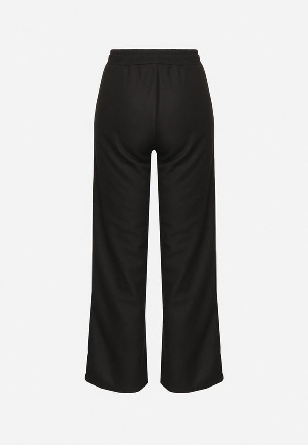 Born2be - Czarne Szerokie Spodnie Dresowe z Ociepleniem i Sznurkiem Nelannea. Okazja: na co dzień. Kolor: czarny. Materiał: dresówka. Styl: elegancki, casual