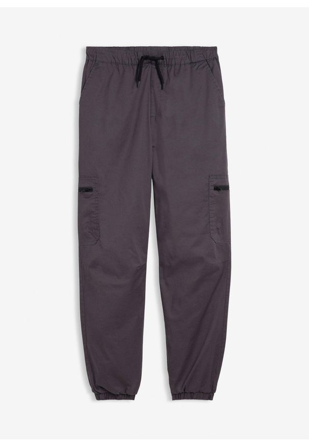 bonprix - Ocieplane spodnie bojówki z dżersejową podszewką o kroju loose fit. Kolor: szary. Materiał: jersey