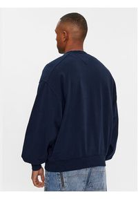 Tommy Jeans Bluza Varsity DM0DM18386 Granatowy Boxy Fit. Kolor: niebieski. Materiał: bawełna