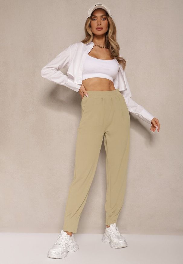 Renee - Jasnozielone Spodnie High Waist z Gumką w Talii Teniela. Stan: podwyższony. Kolor: zielony. Styl: elegancki