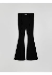 Reserved - Spodnie z szeroką nogawką - czarny. Kolor: czarny. Materiał: dzianina. Wzór: gładki
