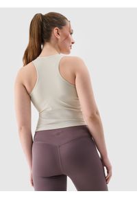 4f - 4F Top treningowy z niskim wsparciem damski - beżowy XXL. Kolor: beżowy. Materiał: guma, syntetyk, materiał, elastan, włókno, dzianina. Długość rękawa: na ramiączkach. Wzór: jednolity, gładki, ze splotem. Sport: joga i pilates, fitness