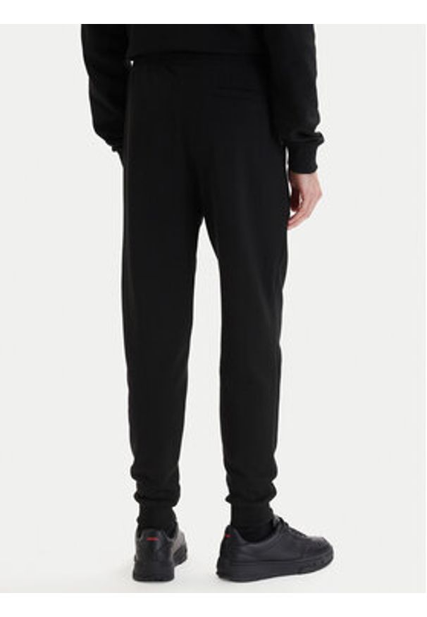 Plein Sport Spodnie dresowe SAFC MJT2788 STE003N Czarny Regular Fit. Kolor: czarny. Materiał: bawełna