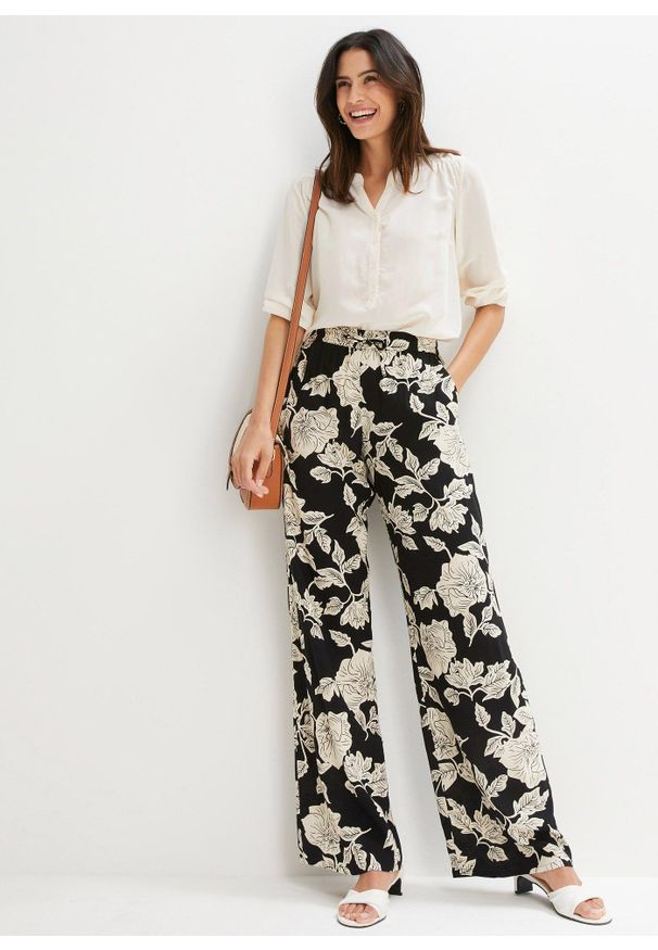 bonprix - Spodnie palazzo z lejącej wiskozy. Kolor: czarny. Materiał: wiskoza. Wzór: nadruk. Styl: elegancki