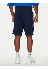 Adidas - adidas Szorty sportowe adicolor 3-Stripes IM9424 Granatowy Regular Fit. Kolor: niebieski. Materiał: bawełna. Styl: sportowy #3