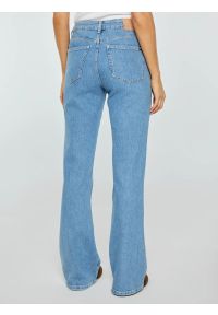 Big-Star - Jeansy damskie bootcut niebieskie Chiara 144. Stan: podwyższony. Kolor: niebieski. Styl: klasyczny, retro, wakacyjny #4