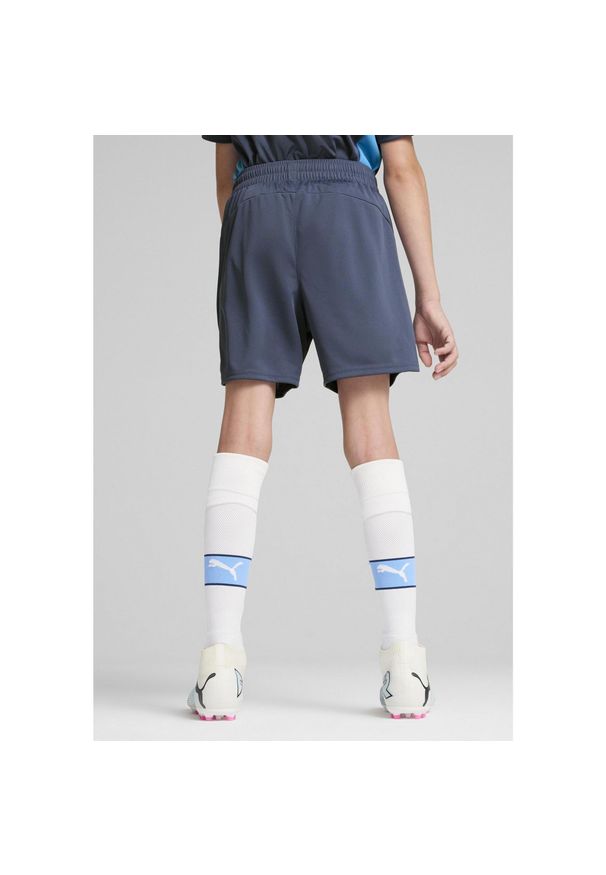 Puma - Młodzieżowe szorty treningowe Manchester City PUMA Inky Blue Magic. Kolor: niebieski