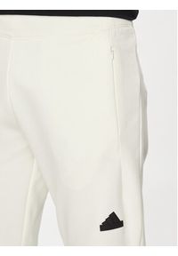 Adidas - adidas Spodnie dresowe Z.N.E. Premium IN1912 Biały Regular Fit. Kolor: biały. Materiał: bawełna