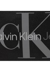 Calvin Klein Jeans Saszetka Sport Essentials Camera Bag17 Mo K50K509431 Czarny. Kolor: czarny. Materiał: materiał #4