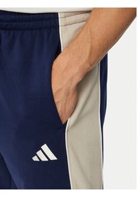Adidas - adidas Spodnie dresowe Seasonal Essentials Colorblock Fleece KF4211 Niebieski Cosy Fleece Fit. Kolor: niebieski. Materiał: syntetyk #3