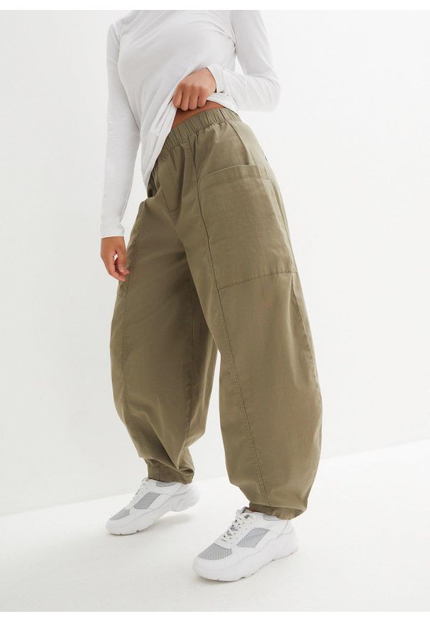 bonprix - Spodnie z bawełnianego diagonalu z domieszką elastanu. Kolor: zielony. Materiał: elastan, bawełna, materiał. Sezon: lato