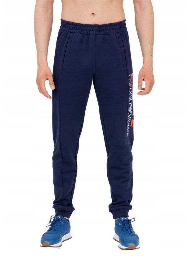 EA7 Emporio Armani - EA7 Długie granatowe spodnie dresowe. Kolor: niebieski. Materiał: bawełna